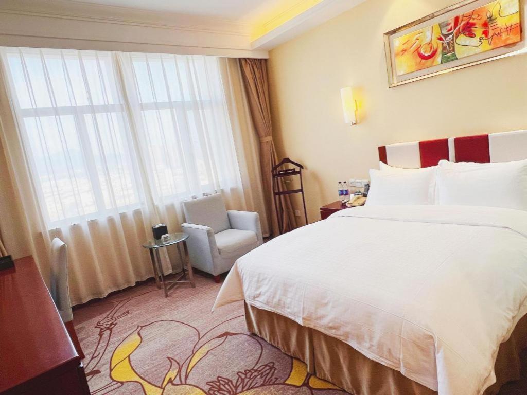 Qingdao Blue Horizon Hotel Licang Esterno foto