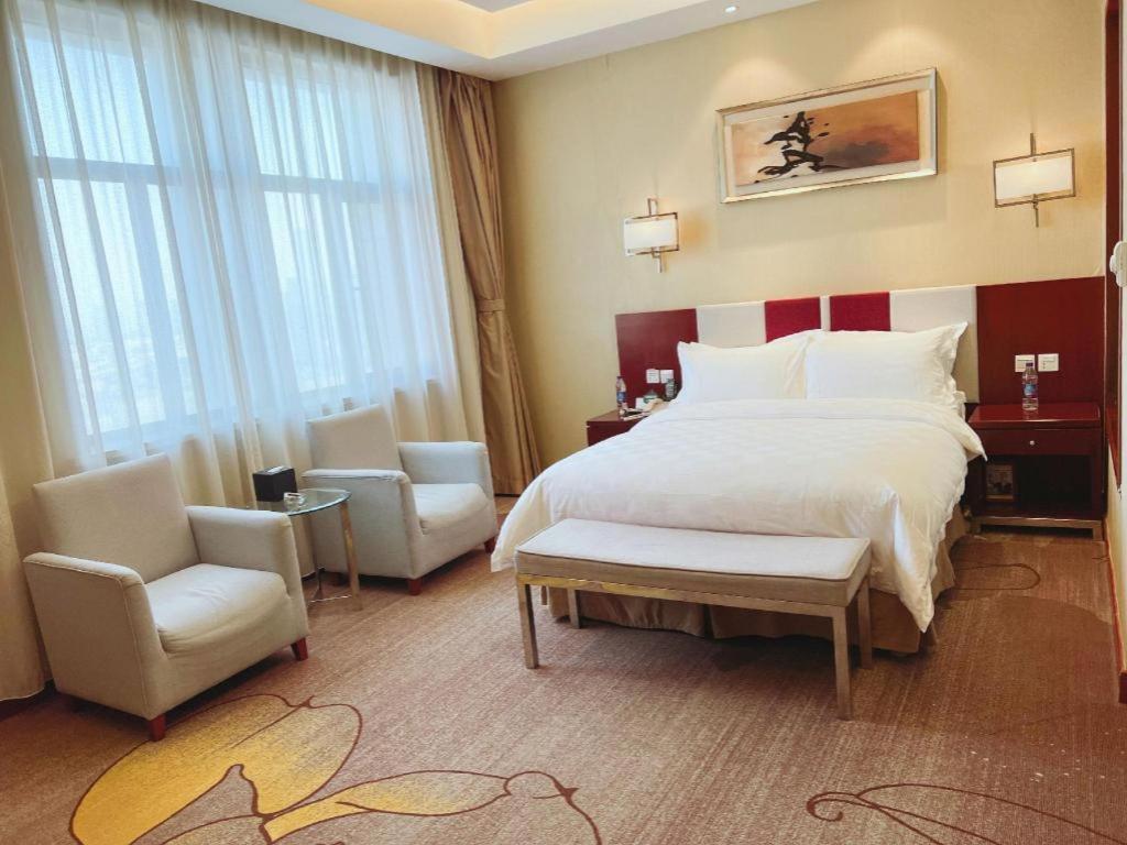 Qingdao Blue Horizon Hotel Licang Esterno foto